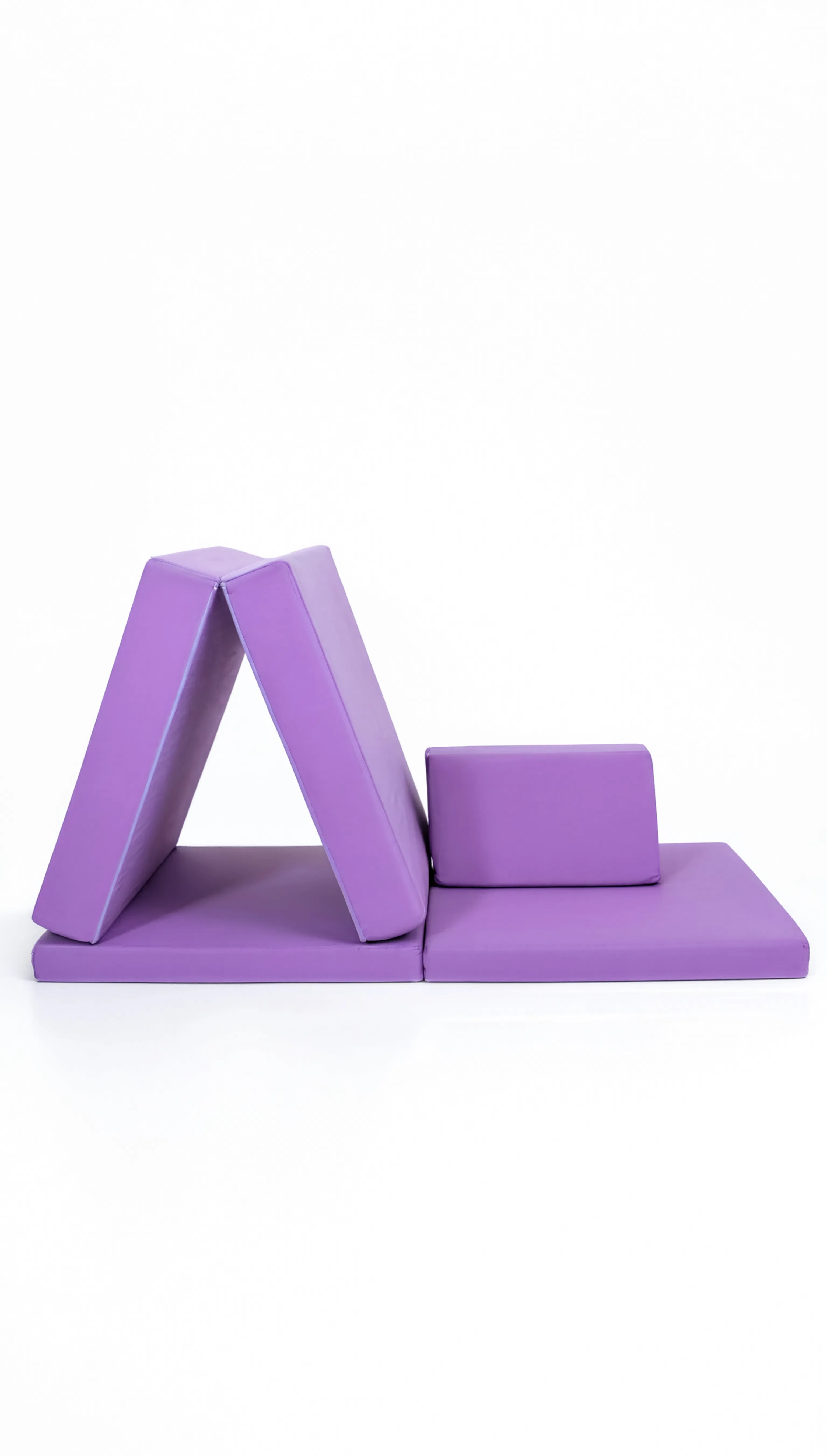 Purple foam gym mat on a white background
