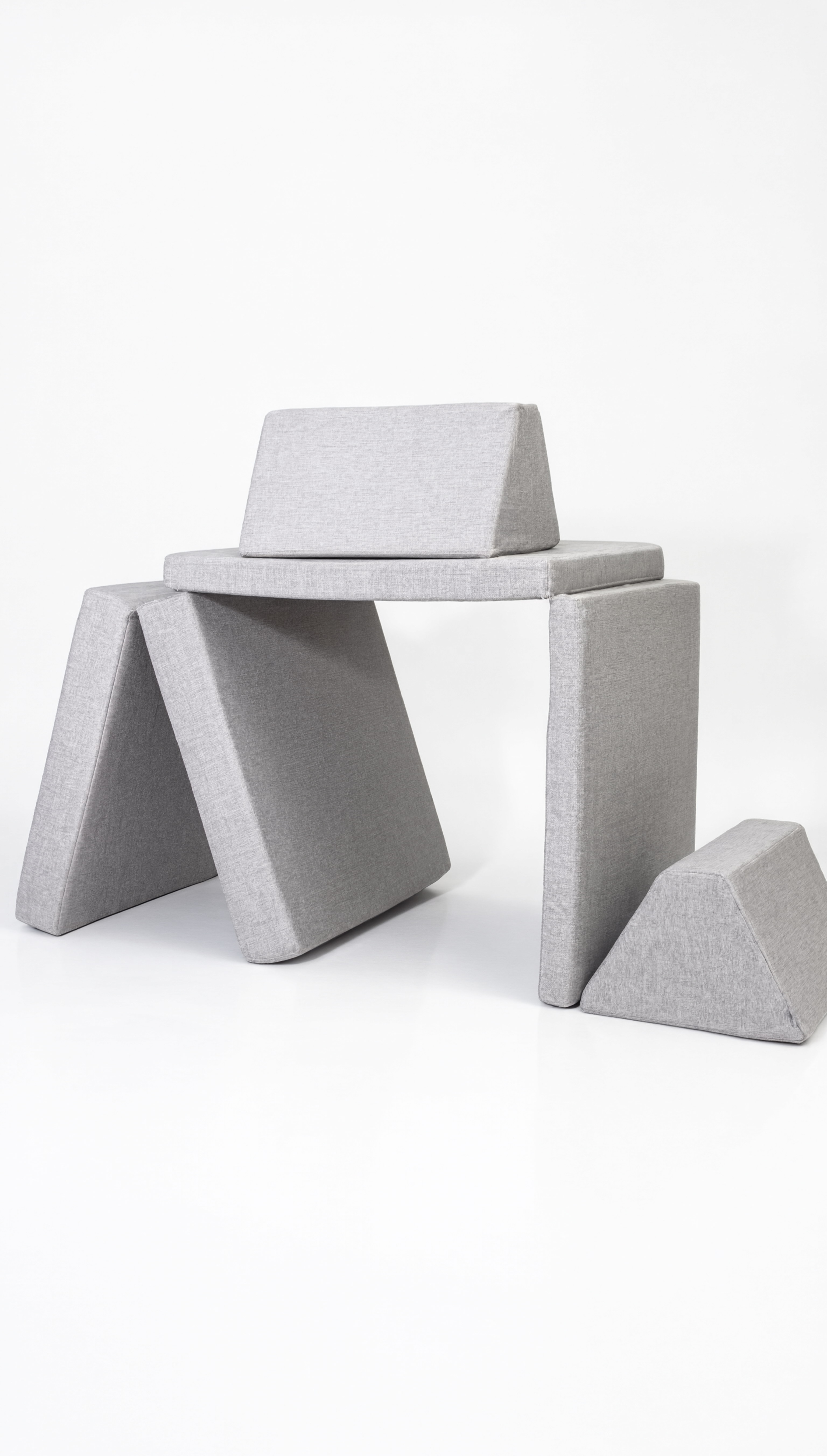 Modern concrete stool with geometric design on a white background