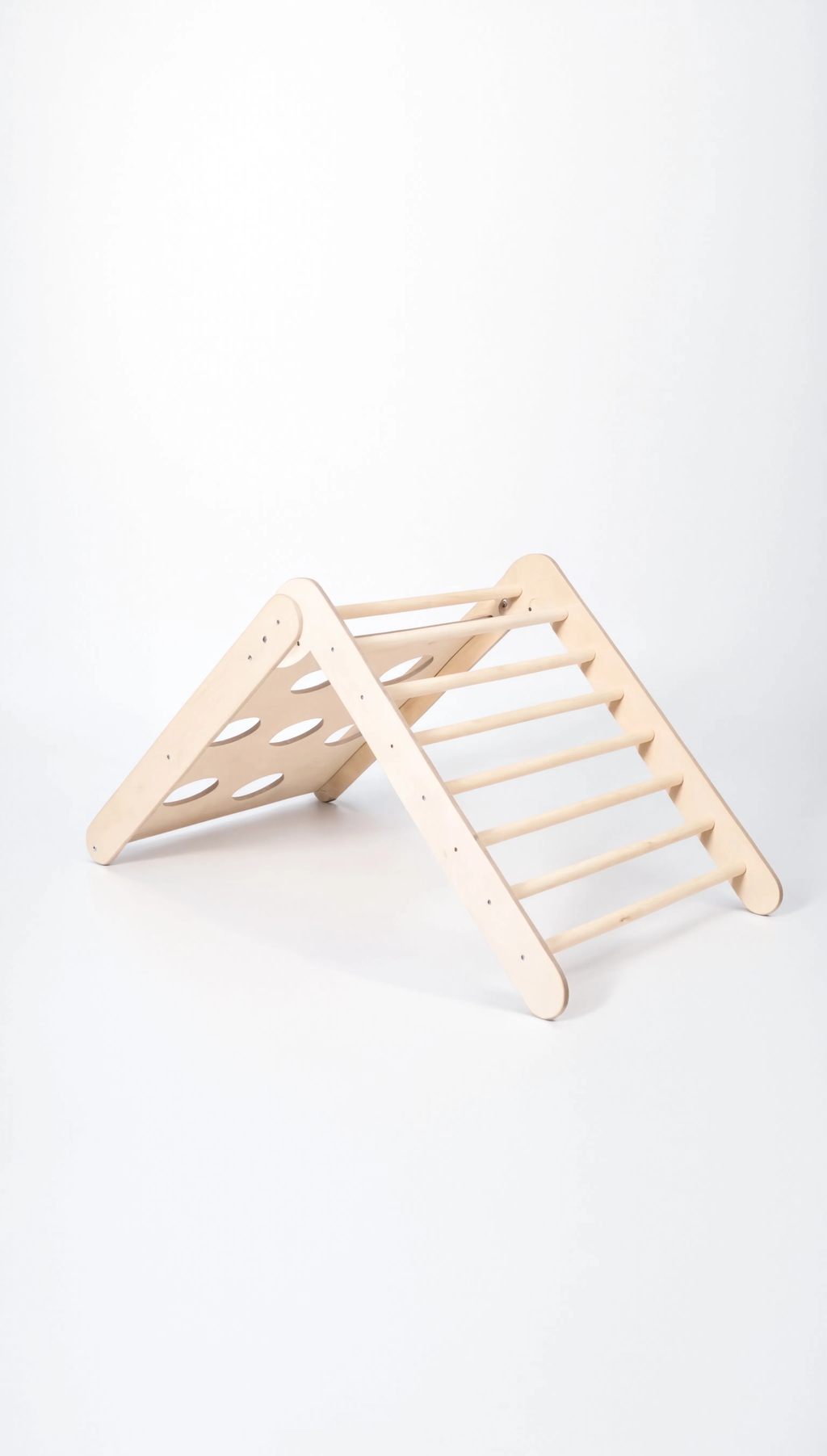 Wooden climbing triangle on a white background